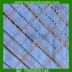 White Dhora Wala Doriya Special Zari Vastra by Nandanshringars, showcasing intricate zari work and elegant draping.