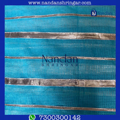 Blue Dhora Wala Doriya Special Zari Vastra by nandanshringars, showcasing intricate zari work and vibrant colors.
