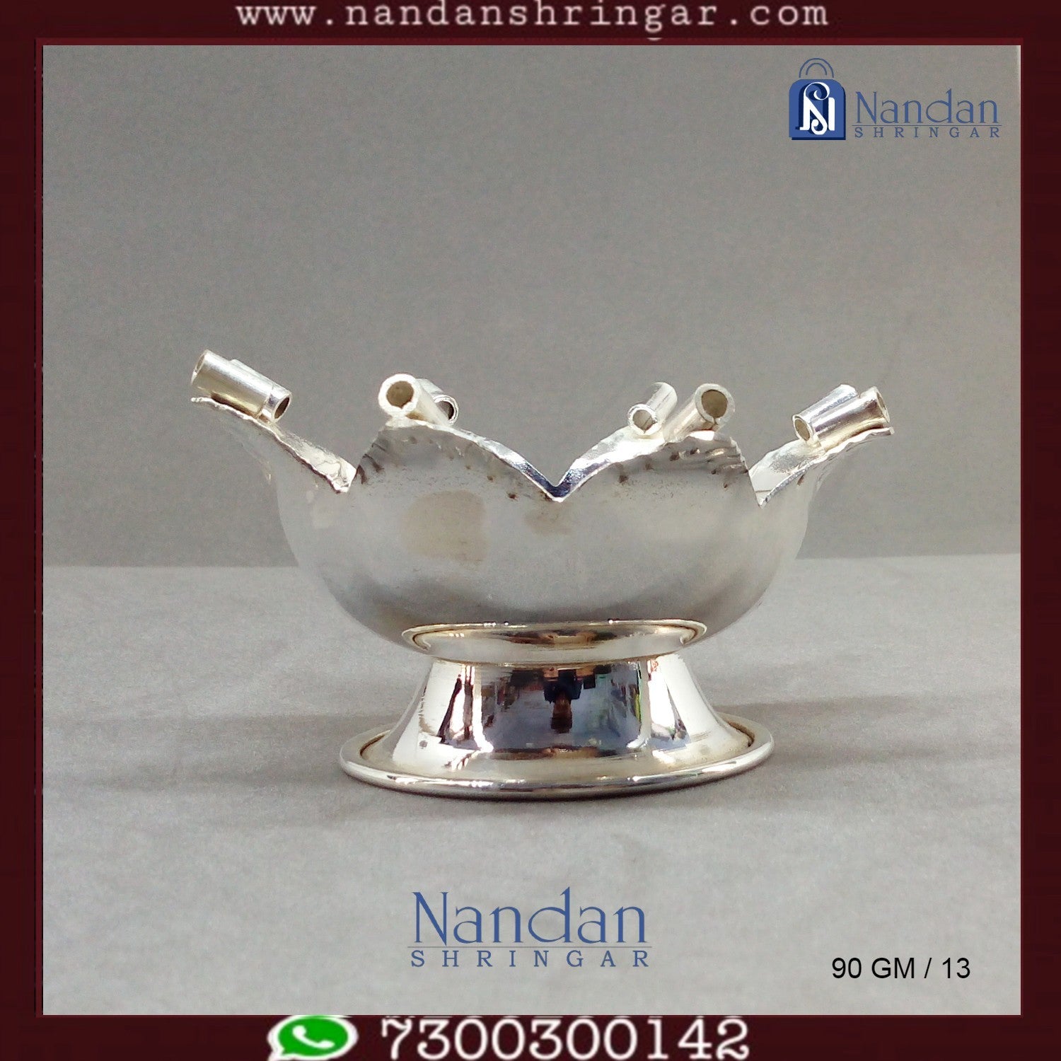 Fine silver Kamal Aarti by Utsav Arts, featuring intricate design and craftsmanship, displayed against a neutral background.