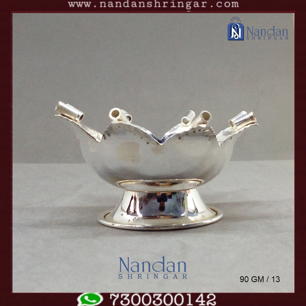 Fine silver Kamal Aarti by Utsav Arts, featuring intricate design and craftsmanship, displayed against a neutral background.