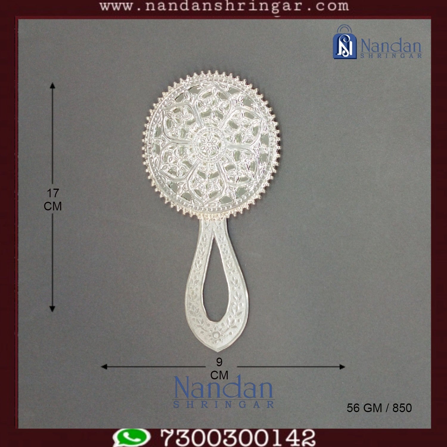 Fine silver Aarsi mirror by Utsav Arts, featuring intricate detailing and a reflective surface, set against a neutral background.