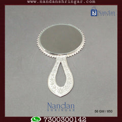 Fine silver Aarsi mirror by Utsav Arts, featuring intricate detailing and a reflective glass surface.