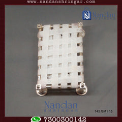 Fine silver palang by Utsav Arts with intricate design, featuring traditional craftsmanship and elegant detailing.