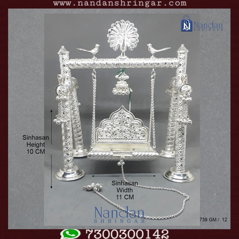 Premium fine silver carving palna by Utsav Arts, showcasing intricate design and craftsmanship in a detailed image.