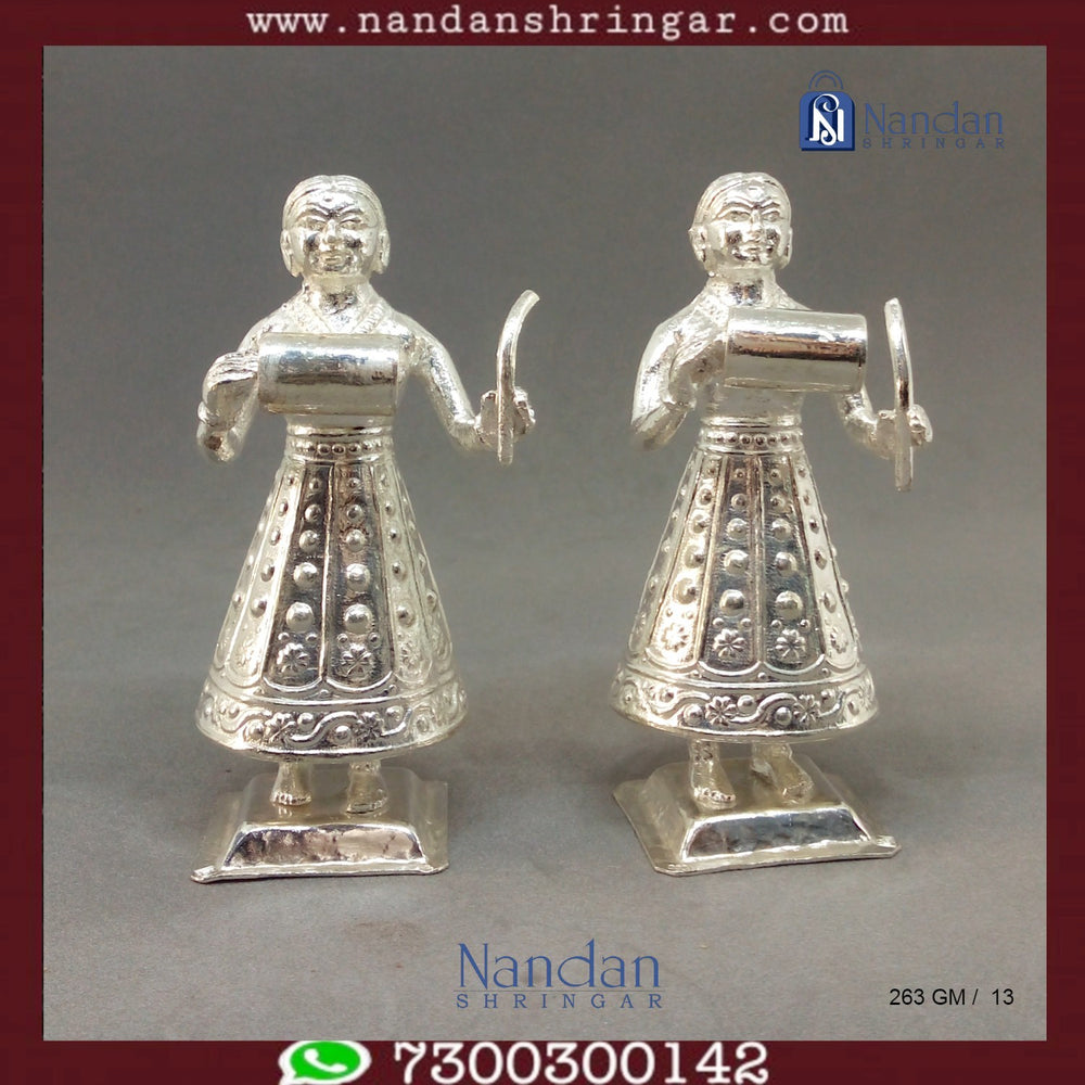 Utsav Arts Gopi Fine Silver earrings, showcasing intricate design and craftsmanship, displayed on a neutral background.