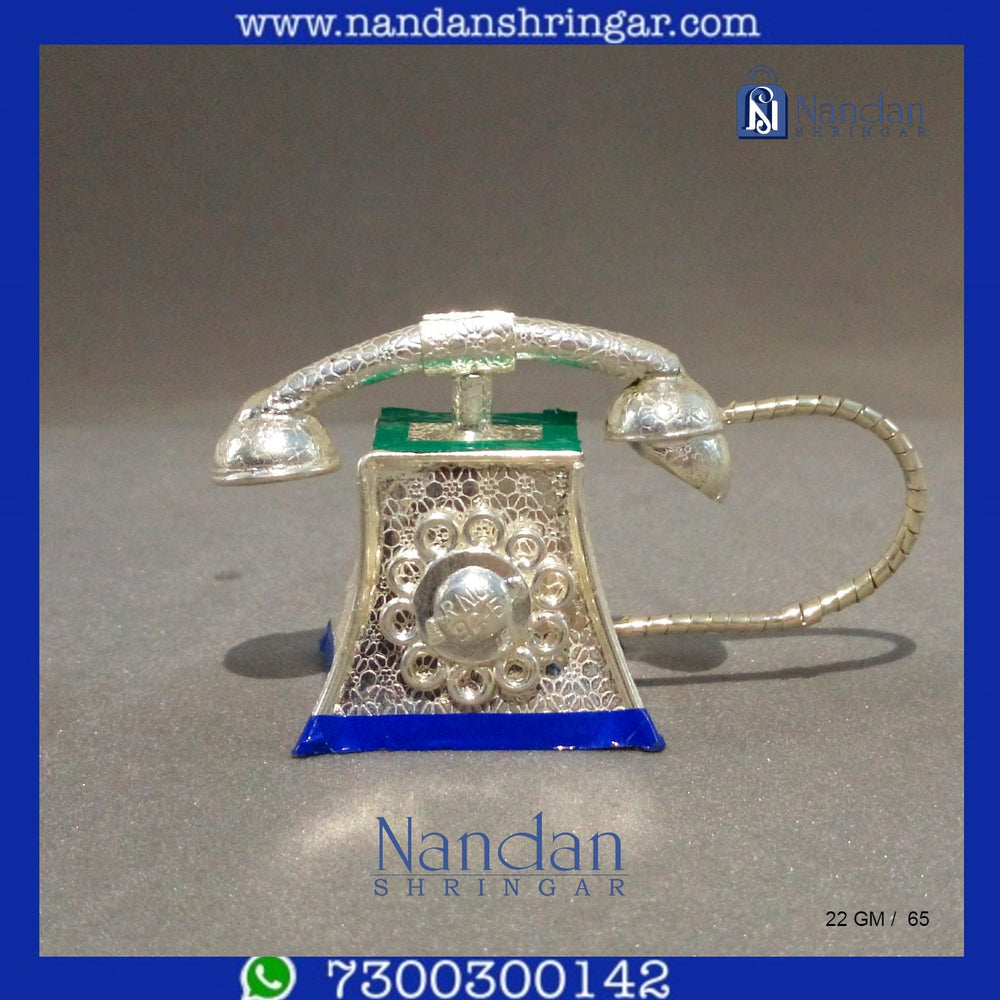 Fine silver telephone by Utsav Arts, showcasing intricate design and craftsmanship in a classic style.