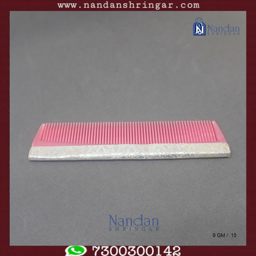Fine silver comb by Utsav Arts, featuring intricate design and smooth finish, displayed on a neutral background.