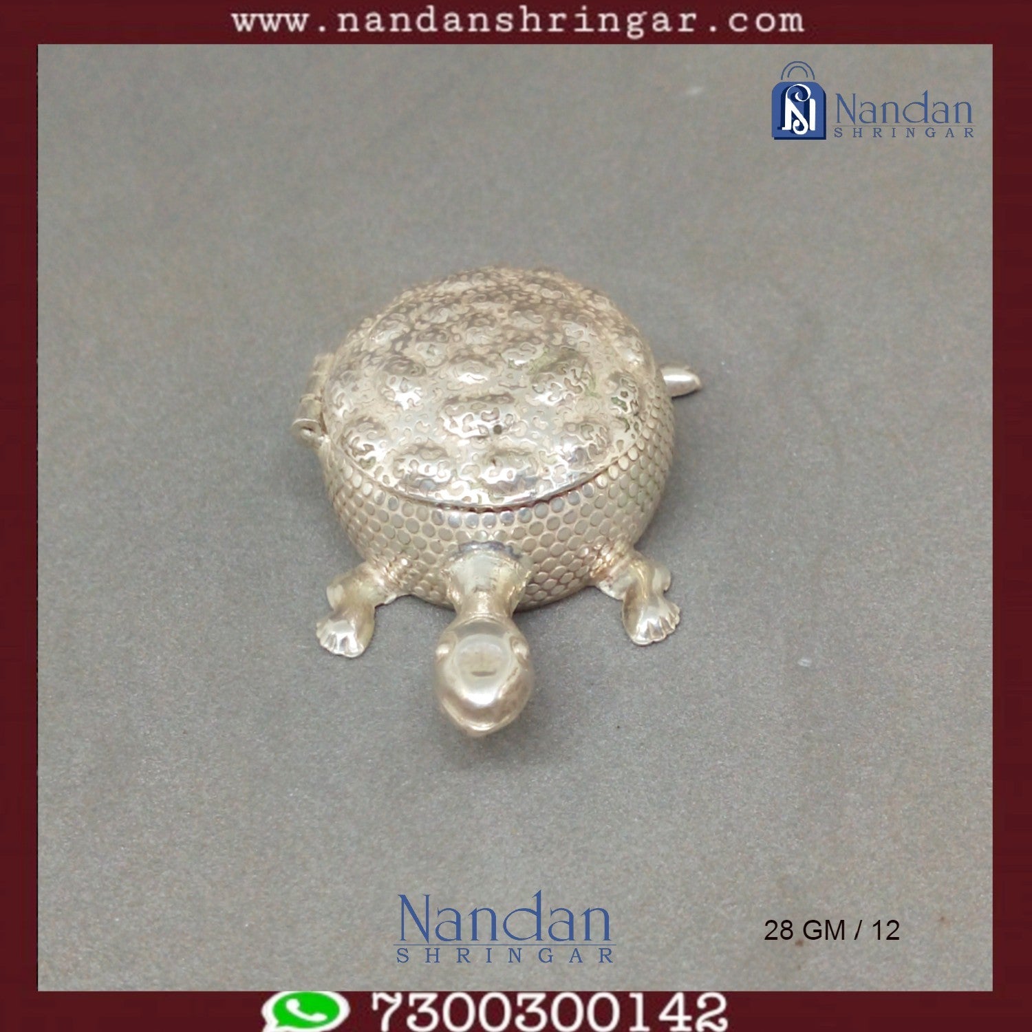 Fine silver tortoise sculpture by Utsav Arts, showcasing intricate details and craftsmanship in a decorative design.
