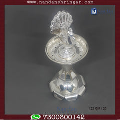 Mayur Fountain in fine silver by Utsav Arts, showcasing intricate detailing and an elegant design.