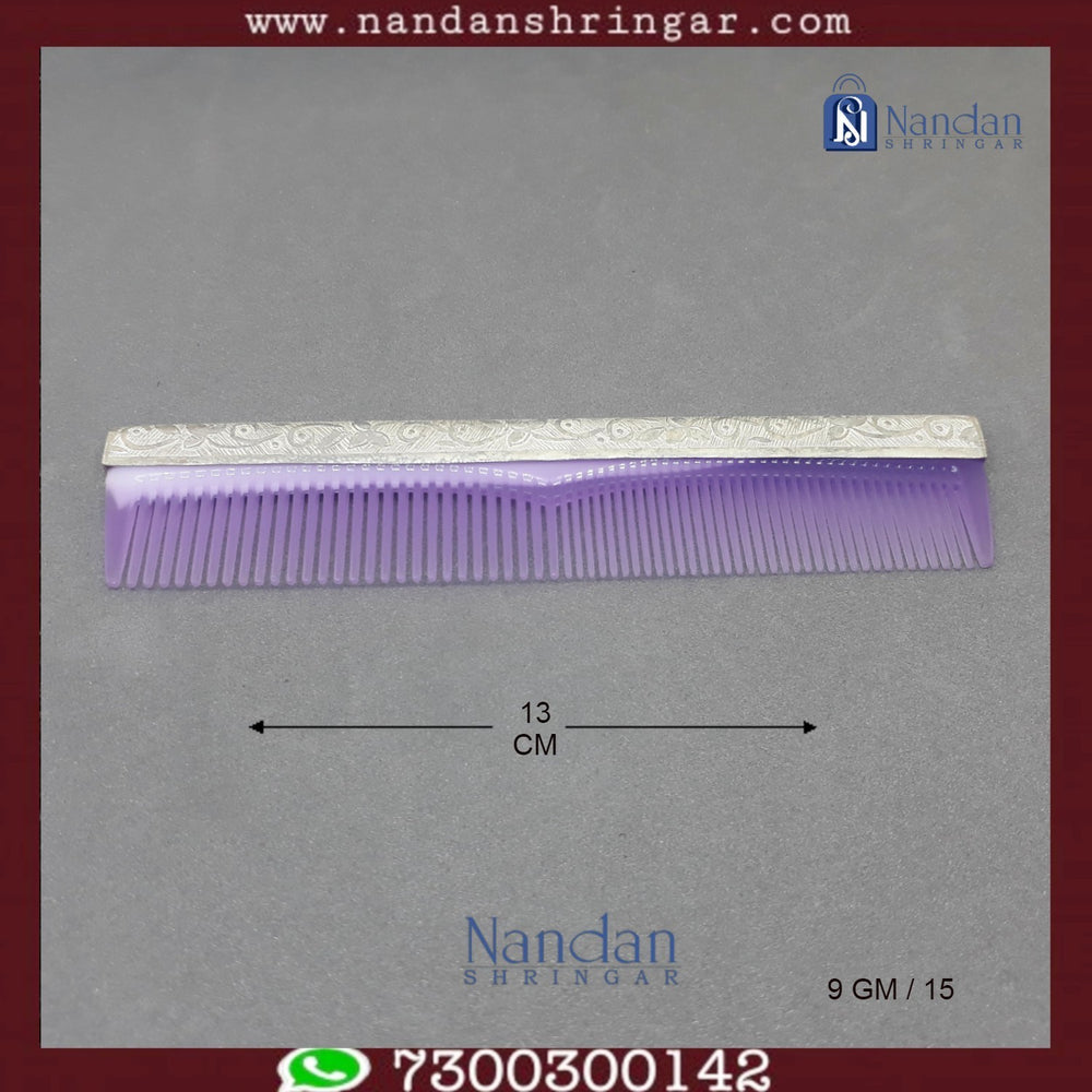 Fine silver comb by Utsav Arts, showcasing intricate detailing and elegant design, perfect for hair styling.