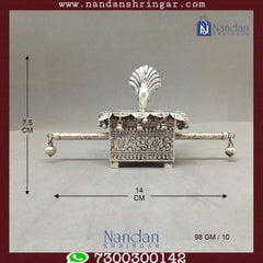 Mayur Doli Box in fine silver by Utsav Arts, showcasing intricate craftsmanship and elegant design details.