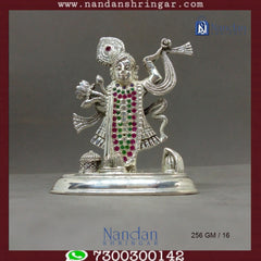 Fine silver Shreenath Ji idol by Utsav Arts, showcasing intricate details and traditional design elements.