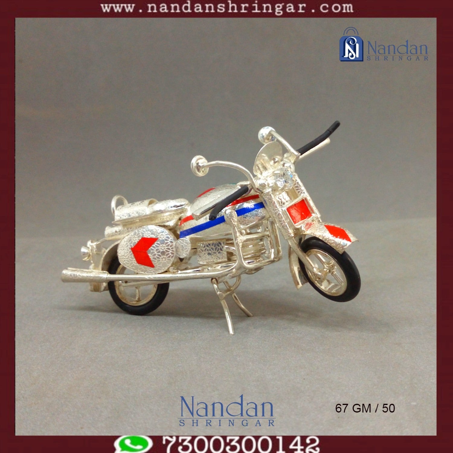 Fine silver motorcycle sculpture by Utsav Arts, showcasing intricate detailing and craftsmanship.