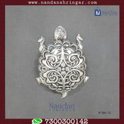 Fine silver tortoise figurine by Utsav Arts, detailed craftsmanship and smooth finish in a natural pose.
