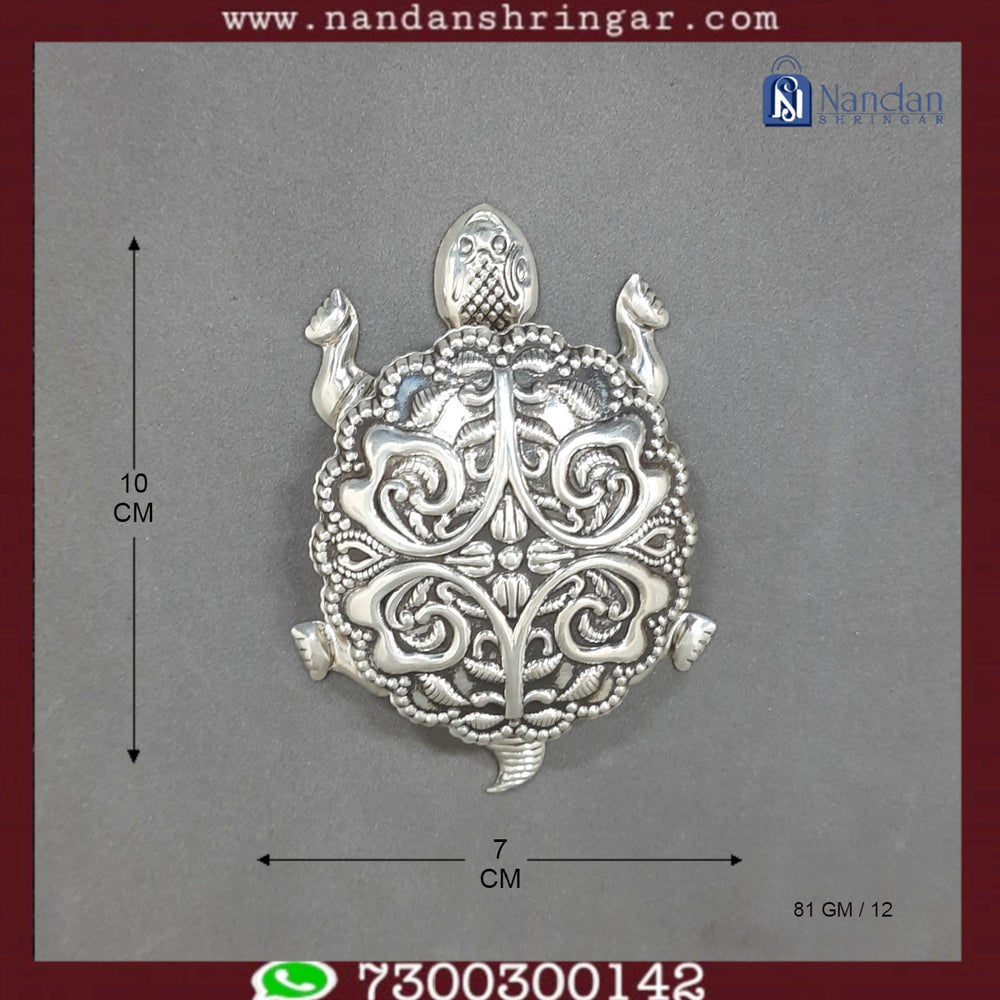 Fine silver tortoise sculpture by Utsav Arts, detailed craftsmanship with a smooth, polished finish and intricate shell design.