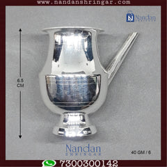 Fine silver jewelry piece by Utsav Arts featuring intricate design and craftsmanship, showcasing a delicate finish.