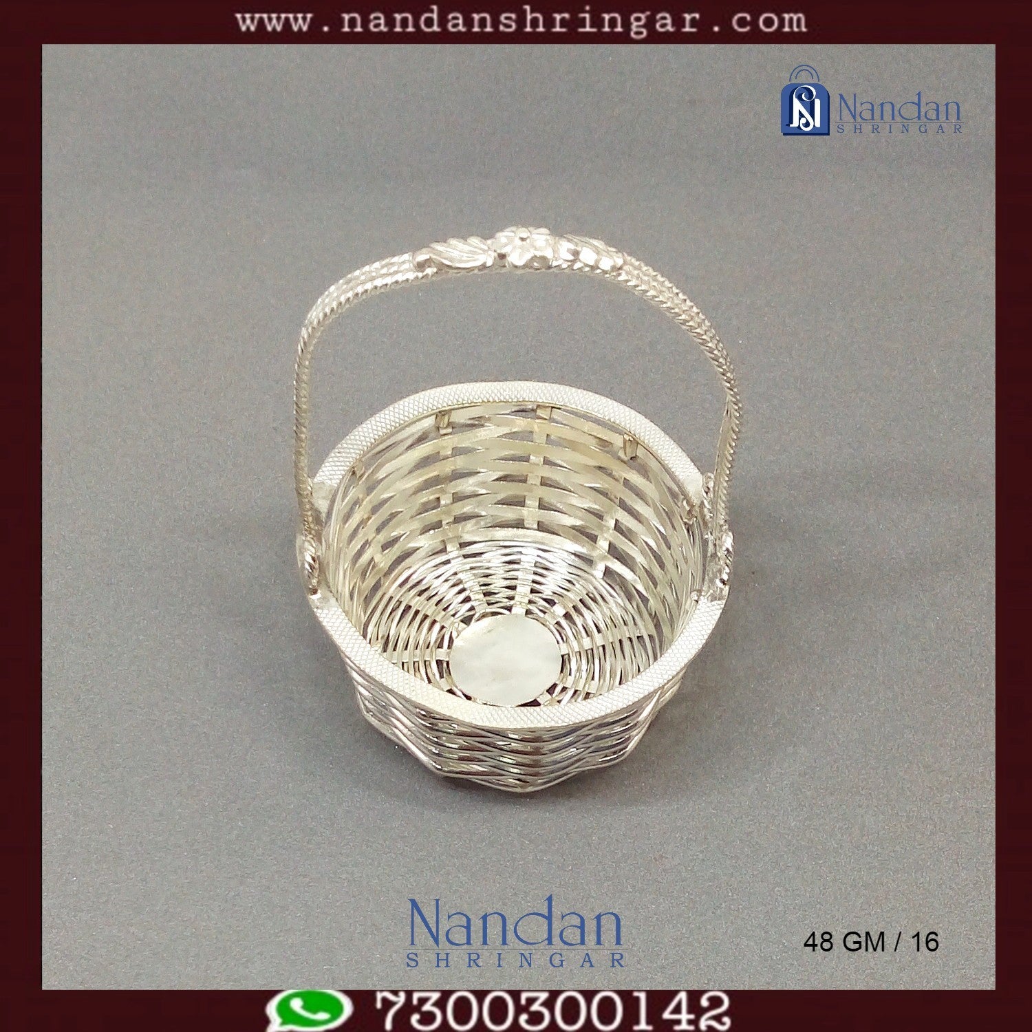 Fine silver basket by Utsav Arts, featuring intricate designs and a polished finish, displayed against a neutral background.