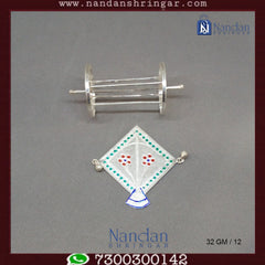 Fine silver Patang Chakri set by Utsav Arts, featuring intricate designs and traditional craftsmanship.
