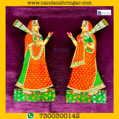 Gopi Morchhal Pair in vibrant orange, featuring intricate designs, by Nandanshringars.