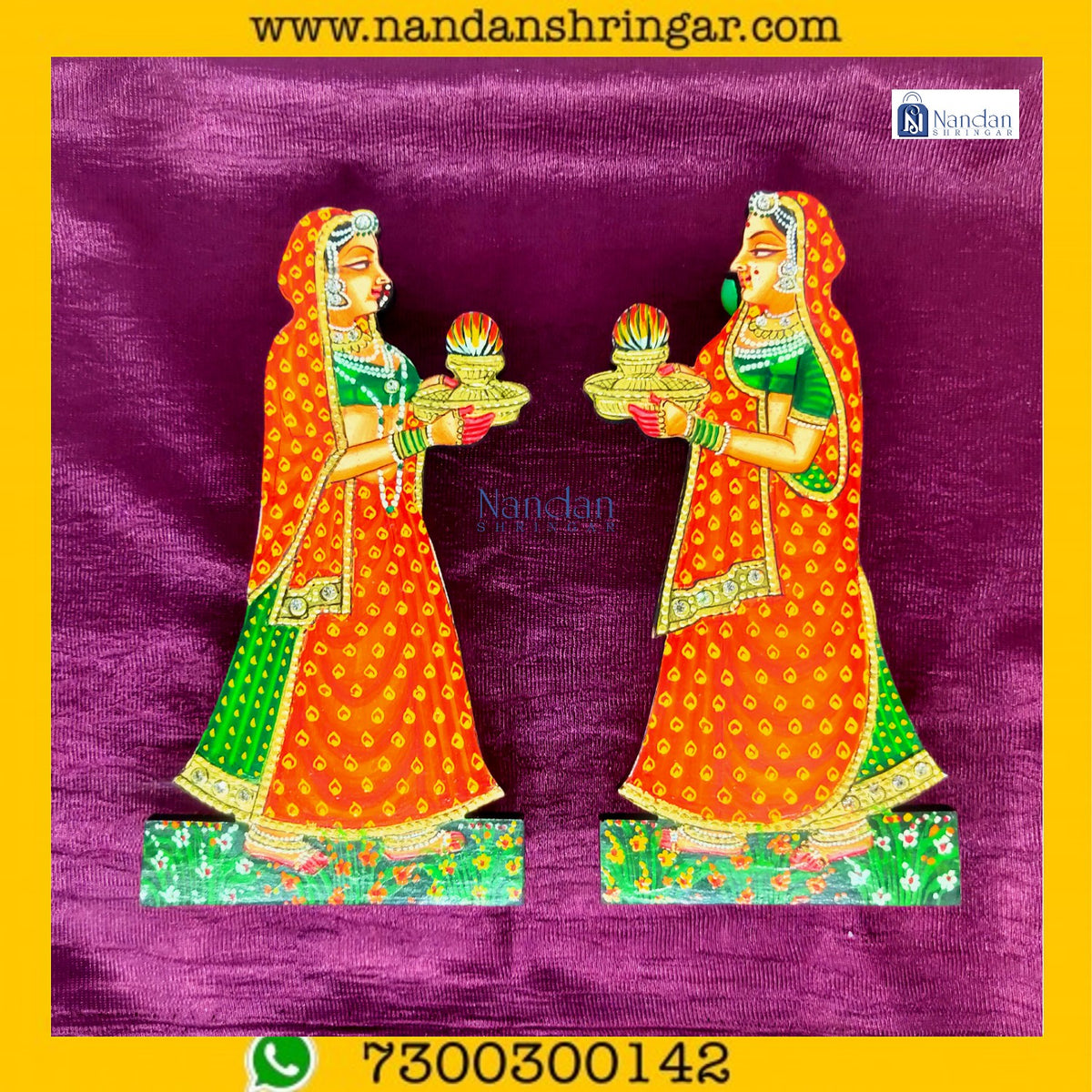 Orange Gopi Aarti pair by Nandanshringars, featuring intricate designs and vibrant colors for traditional worship.