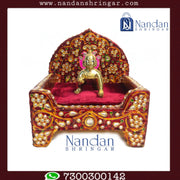 Meenakari Moti Sinhasan jewelry piece with intricate designs, crafted by Nandanshringars, displayed on a white background