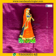 Orange Gopi Shahnaai Pair by NandanShringars, featuring intricate designs and traditional craftsmanship.
